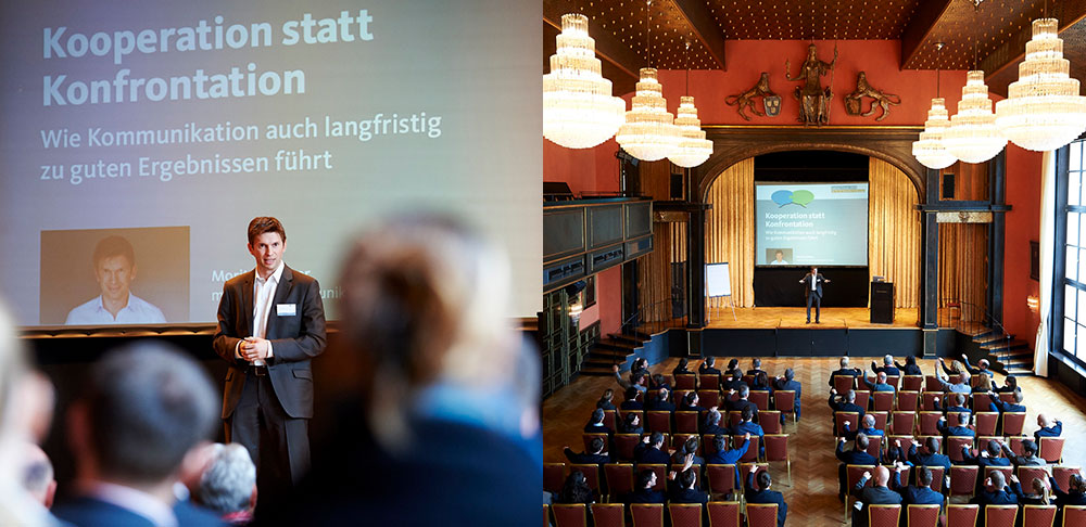 Moritz Küffner beim Vortrag in großem Saal